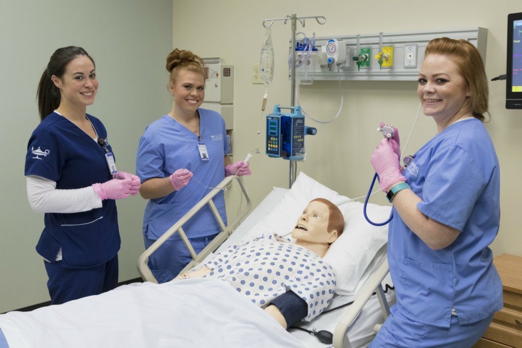 Galen College students in simulator lab.