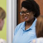 people standing around chatting